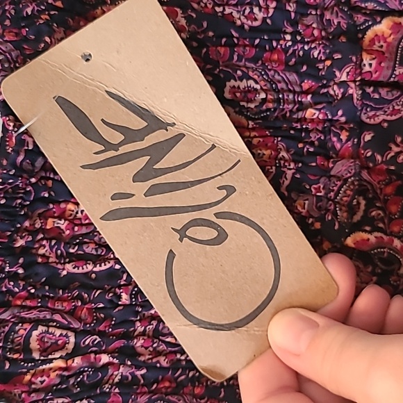 Tiered paisley skirt with flat-front smock-back waist. - Picture 7 of 9